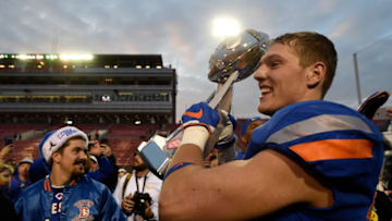 LAS VEGAS, NV - DECEMBER 16: Leighton Vander Esch #38 of the Boise State Broncos celebrates with the trophy after the Broncos defeated the Oregon Ducks in the Las Vegas Bowl at Sam Boyd Stadium on December 16, 2017 in Las Vegas, Nevada. Boise State won 38-28. (Photo by David Becker/Getty Images)