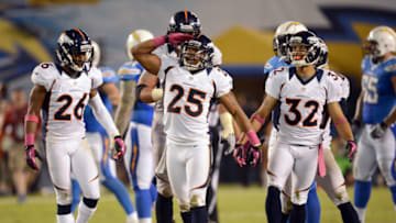 SAN DIEGO, CA - OCTOBER 15: Chris Harris #25 of the Denver Broncos celebrates his interception against the San Diego Chargers at Qualcomm Stadium on October 15, 2012 in San Diego, California. (Photo by Harry How/Getty Images)