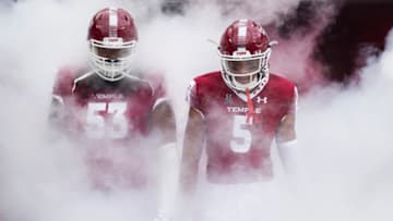 PHILADELPHIA, PA - SEPTEMBER 30: Leon Johnson #53 and Keith Kirkwood #5 of the Temple Owls walk out of the tunnel prior to the game against the Houston Cougars at Lincoln Financial Field on September 30, 2017 in Philadelphia, Pennsylvania. (Photo by Mitchell Leff/Getty Images)