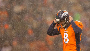 DENVER, CO - NOVEMBER 29: Kicker Brandon McManus #8 of the Denver Broncos walks off of the field after missing a third quarter field goal against the New England Patriots at Sports Authority Field at Mile High on November 29, 2015 in Denver, Colorado. (Photo by Justin Edmonds/Getty Images)