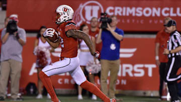 SALT LAKE CITY, UT - SEPTEMBER 01: Wide receiver Tim Patrick #12 of the Utah Utes scores on a 57 yard pass reception, in the fourth quarter of their 24-0 win over the Southern Utah Thunderbirds, at Rice-Eccles Stadium on September 1, 2016 in Salt Lake City, Utah. (Photo by Gene Sweeney Jr/Getty Images)