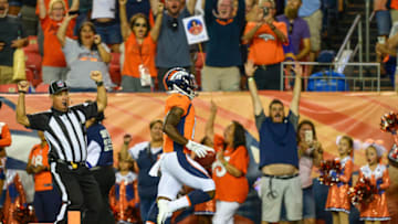 DENVER, CO - AUGUST 11: Wide receiver Isaiah McKenzie #16 of the Denver Broncos returns the ball 78 yards on a punt return for a second quarter touchdown against the Minnesota Vikings during an NFL preseason game at Broncos Stadium at Mile High on August 11, 2018 in Denver, Colorado. (Photo by Dustin Bradford/Getty Images)