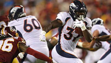 LANDOVER, MD - AUGUST 24: Running back Royce Freeman #37 of the Denver Broncos rushes for a touchdown against the Washington Redskins in the first quarter during a preseason game at FedExField on August 24, 2018 in Landover, Maryland. (Photo by Patrick Smith/Getty Images)