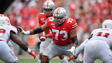 COLUMBUS, OH - AUGUST 31: Jonah Jackson #73 of the Ohio State Buckeyes guards against the Florida Atlantic Owls at Ohio Stadium on August 31, 2019 in Columbus, Ohio. (Photo by Jamie Sabau/Getty Images)