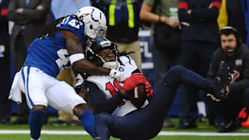 INDIANAPOLIS, IN - OCTOBER 20: DeAndre Hopkins #10 of the Houston Texans is tackled by Shakial Taylor #47 of the Indianapolis Colts after making a catch in the second quarter of the game at Lucas Oil Stadium on October 20, 2019 in Indianapolis, Indiana. (Photo by Bobby Ellis/Getty Images)