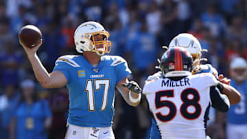 CARSON, CALIFORNIA - OCTOBER 06: Philip Rivers #17 of the Los Angeles Chargers looks to pass as Von Miller #58 of the Denver Broncos defends during the second half of a game at Dignity Health Sports Park on October 06, 2019 in Carson, California. (Photo by Sean M. Haffey/Getty Images)