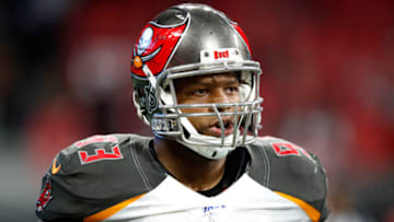 ATLANTA, GA - NOVEMBER 24: Ndamukong Suh #93 of the Tampa Bay Buccaneers reacts after returning a fumble for a touchdown during the second half of an NFL game against the Atlanta Falcons at Mercedes-Benz Stadium on November 24, 2019 in Atlanta, Georgia. (Photo by Todd Kirkland/Getty Images)