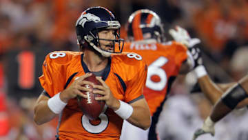 DENVER, CO - SEPTEMBER 12: Quarterback Kyle Orton #8 of the Denver Broncos drops back to pass against the Oakland Raiders in the first half at Sports Authority Field at Mile High on September 12, 2011 in Denver, Colorado. (Photo by Doug Pensinger/Getty Images)