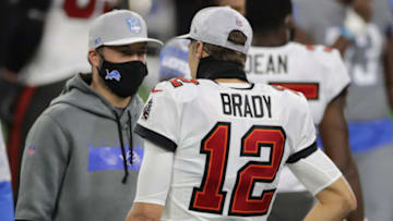DETROIT, MICHIGAN - DECEMBER 26: Tom Brady #12 of the Tampa Bay Buccaneers speaks with Matthew Stafford #9 of the Detroit Lions following a game at Ford Field on December 26, 2020 in Detroit, Michigan. (Photo by Leon Halip/Getty Images)