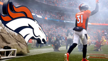 DENVER, COLORADO - OCTOBER 31: Justin Simmons #31 of the Denver Broncos takes the field before the game against the Washington Football Team at Empower Field At Mile High on October 31, 2021 in Denver, Colorado. (Photo by Justin Edmonds/Getty Images)