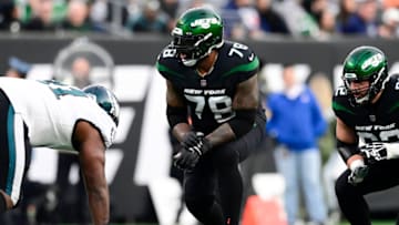 Denver Broncos: Morgan Moses #78 of the New York Jets lines up against the Philadelphia Eagles at MetLife Stadium on December 05, 2021 in East Rutherford, New Jersey. (Photo by Steven Ryan/Getty Images)