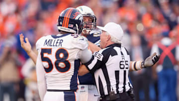 SAN DIEGO, CA - DECEMBER 06: Quarterbck Philip Rivers #17 of the San Diego Chargers and linebacker Von Miller #58 of the Denver Broncos are separated by referee Walt Coleman as they have an altercation at Qualcomm Stadium on December 6, 2015 in San Diego, California. (Photo by Stephen Dunn/Getty Images)