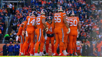 DENVER, CO - NOVEMBER 25: The Denver Broncos offense huddles around quarterback Case Keenum #4 in the second quarter of a game against the Pittsburgh Steelers at Broncos Stadium at Mile High on November 25, 2018 in Denver, Colorado. (Photo by Dustin Bradford/Getty Images)