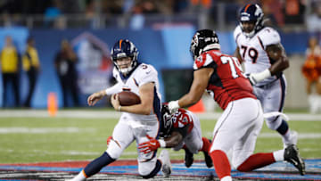 CANTON, OH - AUGUST 01: Drew Lock #3 of the Denver Broncos tries to avoid pressure in the first half of a preseason game against the Atlanta Falcons at Tom Benson Hall Of Fame Stadium on August 1, 2019 in Canton, Ohio. (Photo by Joe Robbins/Getty Images)