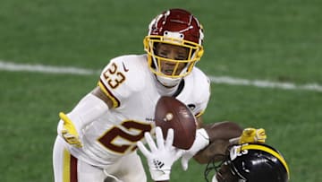 Dec 7, 2020; Pittsburgh, Pennsylvania, USA; Washington Football Team cornerback Ronald Darby (23) breaks up a pass intended or Pittsburgh Steelers wide receiver James Washington (13) during the first quarter at Heinz Field. Mandatory Credit: Charles LeClaire-USA TODAY Sports
