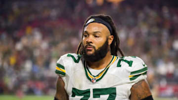 Oct 28, 2021; Glendale, Arizona, USA; Green Bay Packers guard Billy Turner (77) against the Arizona Cardinals at State Farm Stadium. Mandatory Credit: Mark J. Rebilas-USA TODAY Sports