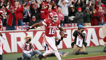 Denver Broncos 2022 NFL Draft; Arkansas Razorbacks wide receiver Treylon Burks (16) celebrates after a touchdown against the Missouri Tigers in the third quarter at Donald W. Reynolds Razorbacks Stadium. Arkansas won 34-17. Mandatory Credit: Nelson Chenault-USA TODAY Sports