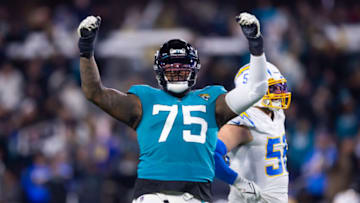 Jan 14, 2023; Jacksonville, Florida, USA; Jacksonville Jaguars offensive tackle Jawaan Taylor (75) reacts against the Los Angeles Chargers during a wild card playoff game at TIAA Bank Field. Mandatory Credit: Mark J. Rebilas-USA TODAY Sports