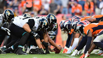 Sep 29, 2019; Denver, CO, USA; The Jacksonville Jaguars and the Denver Broncos line up for the final play of the fourth quarter at Empower Field at Mile High. Mandatory Credit: Ron Chenoy-USA TODAY Sports