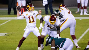 Jan 3, 2021; Philadelphia, Pennsylvania, USA; Washington Football Team quarterback Alex Smith (11) passes the ball against the Philadelphia Eagles during the first quarter at Lincoln Financial Field. Mandatory Credit: Bill Streicher-USA TODAY Sports