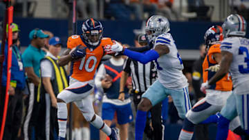 Nov 7, 2021; Arlington, Texas, USA; Denver Broncos wide receiver Jerry Jeudy (10) catches a pass for a first down against the Dallas Cowboys during the second half at AT&T Stadium. Mandatory Credit: Jerome Miron-USA TODAY Sports