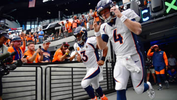 Oct 2, 2022; Paradise, Nevada, USA; Denver Broncos quarterback Russell Wilson (3) and quarterback Brett Rypien (4) take the field before playing against the Las Vegas Raiders at Allegiant Stadium. Mandatory Credit: Gary A. Vasquez-USA TODAY Sports