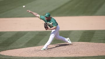 Liam Hendriks of the Oakland Athletics pitches during the game against the Chicago White Sox. (Photo by Michael Zagaris/Oakland Athletics/Getty Images)