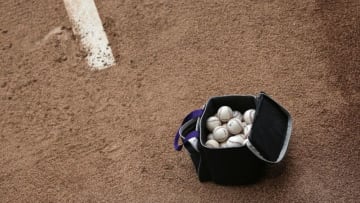 DENVER, CO - APRIL 25: A bag of baseballs sits on the mound in the bullpen as the Pittsburgh Pirates prepare to face the Colorado Rockies at Coors Field on April 25, 2016 in Denver, Colorado. (Photo by Doug Pensinger/Getty Images)