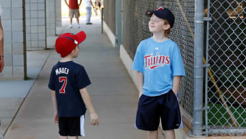 FORT MYERS, FL - FEBRUARY 23: Young fans of the Minnesota Twins wait for the players during a spring training workout session at Hammond Stadium on February 23, 2011 in Fort Myers, Florida. (Photo by J. Meric/Getty Images)