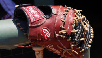 BOSTON, MA - June 4: A Rawlings baseball glove is seen at the Minnesota Twins dugout before the game between the Boston Red Sox and the Minnesota Twins at Fenway Park on June 4, 2015 in Boston, Massachusetts. (Photo by Winslow Townson/Getty Images)