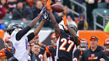 Jan 1, 2017; Cincinnati, OH, USA; Baltimore Ravens wide receiver Breshad Perriman (18) and Cincinnati Bengals cornerback Dre Kirkpatrick (27) battle for a ball in the second half at Paul Brown Stadium. The Bengals won 27-10. Mandatory Credit: Aaron Doster-USA TODAY Sports