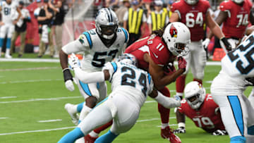 GLENDALE, ARIZONA - SEPTEMBER 22: Larry Fitzgerald #11 of the Arizona Cardinals catches a touchdown pass from Kyler Murray #1 while being defended by James Bradberry #24 of the Carolina Panthers during the first half at State Farm Stadium on September 22, 2019 in Glendale, Arizona. (Photo by Norm Hall/Getty Images)