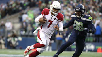 SEATTLE, WASHINGTON - DECEMBER 22: Brett Hundley #7 of the Arizona Cardinals runs with the ball in the third quarter against Rasheem Green #98 of the Seattle Seahawks during their game at CenturyLink Field on December 22, 2019 in Seattle, Washington. (Photo by Abbie Parr/Getty Images)