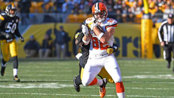 PITTSBURGH, PA - JANUARY 01: Gary Barnidge PITTSBURGH, PA - JANUARY 01: Gary Barnidge #82 of the Cleveland Browns runs upfield after a catch in front of Arthur Moats #55 of the Pittsburgh Steelers in the first half during the game at Heinz Field on January 1, 2017 in Pittsburgh, Pennsylvania. (Photo by Joe Sargent/Getty Images)