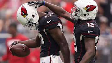 GLENDALE, AZ - OCTOBER 15: Wide receiver Jaron Brown #13 of the Arizona Cardinals is congratulated byJohn Brown #12 during the first half of the NFL game against the Tampa Bay Buccaneers at the University of Phoenix Stadium on October 15, 2017 in Glendale, Arizona. (Photo by Christian Petersen/Getty Images)