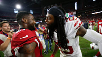 GLENDALE, AZ - OCTOBER 28: Patrick Peterson #21 of the Arizona Cardinals and Richard Sherman #25 of the San Francisco 49ers talk on the field following the game at State Farm Stadium on October 28, 2018 in Glendale, Arizona. The Cardinals defeated the 49ers 18-15. (Photo by Michael Zagaris/San Francisco 49ers/Getty Images)