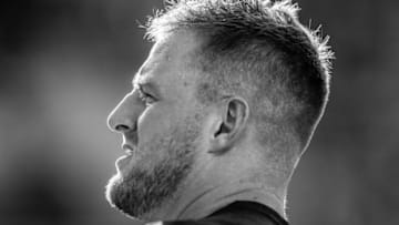 GREEN BAY, WISCONSIN - AUGUST 08: (EDITOR'S NOTE: This image has been converted to black and white). J.J. Watt #99 of the Houston Texans looks on before a preseason game against the Green Bay Packers at Lambeau Field on August 08, 2019 in Green Bay, Wisconsin. (Photo by Dylan Buell/Getty Images)