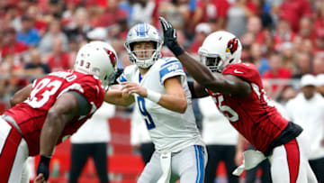 GLENDALE, ARIZONA - SEPTEMBER 08: Quarterback Matthew Stafford # 9 of the Detroit Lions is sacked by Chandler Jones #55 of the Arizona Cardinals during the first half of the NFL football game at State Farm Stadium on September 08, 2019 in Glendale, Arizona. (Photo by Ralph Freso/Getty Images)