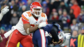 FOXBOROUGH, MASSACHUSETTS - DECEMBER 08: Chris Jones #95 of the Kansas City Chiefs sacks Tom Brady #12 of the New England Patriots during the third quarter in the game at Gillette Stadium on December 08, 2019 in Foxborough, Massachusetts. (Photo by Kathryn Riley/Getty Images)