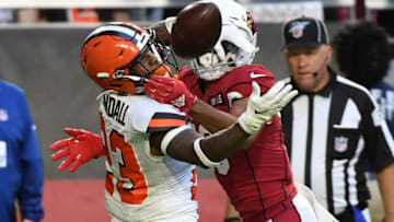 GLENDALE, ARIZONA - DECEMBER 15: Damarious Randall #23 of the Cleveland Browns battles for the ball with Christian Kirk #13 of the Arizona Cardinals during the second half at State Farm Stadium on December 15, 2019 in Glendale, Arizona. Cardinals won 38-24. (Photo by Norm Hall/Getty Images)
