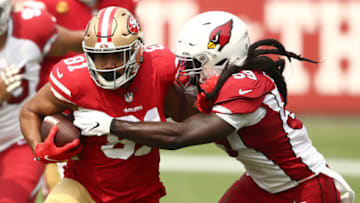 SANTA CLARA, CALIFORNIA - SEPTEMBER 13: Jordan Reed #81 of the San Francisco 49ers is tackled by De'Vondre Campbell #59 of the Arizona Cardinals at Levi's Stadium on September 13, 2020 in Santa Clara, California. (Photo by Ezra Shaw/Getty Images)
