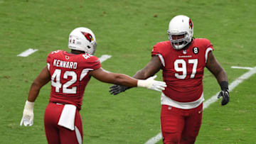 GLENDALE, ARIZONA - SEPTEMBER 27: Jordan Phillips #97 of the Arizona Cardinals celebrates with Devon Kennard #42 after sacking Matthew Stafford #9 of the Detroit Lions during the first quarter at State Farm Stadium on September 27, 2020 in Glendale, Arizona. (Photo by Norm Hall/Getty Images)