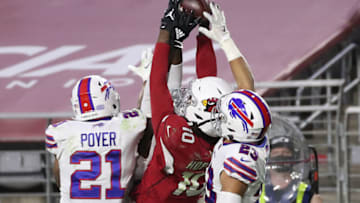GLENDALE, ARIZONA - NOVEMBER 15: Wide receiver DeAndre Hopkins #10 of the Arizona Cardinals catches the game-winning touchdown pass as safety Jordan Poyer #21 and safety Micah Hyde #23 of the Buffalo Bills defend during the final seconds of the fourth quarter at State Farm Stadium on November 15, 2020 in Glendale, Arizona. (Photo by Christian Petersen/Getty Images)