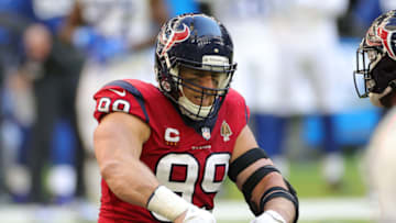HOUSTON, TEXAS - DECEMBER 06: J.J. Watt #99 of the Houston Texans celebrates the play against the Indianapolis Colts during the second half at NRG Stadium on December 06, 2020 in Houston, Texas. (Photo by Carmen Mandato/Getty Images)