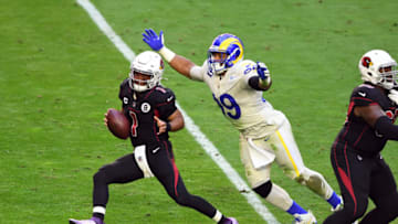 GLENDALE, ARIZONA - DECEMBER 06: Kyler Murray #1 of the Arizona Cardinals attempts to avoid a sack by Aaron Donald #99 of the Los Angeles Rams at State Farm Stadium on December 06, 2020 in Glendale, Arizona. (Photo by Norm Hall/Getty Images)