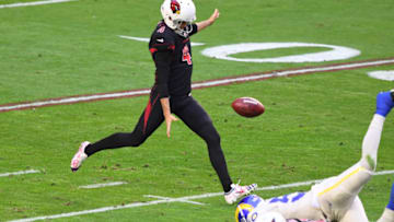 GLENDALE, ARIZONA - DECEMBER 06: Andy Lee #4 of the Arizona Cardinals punts the ball against the Los Angeles Rams at State Farm Stadium on December 06, 2020 in Glendale, Arizona. (Photo by Norm Hall/Getty Images)