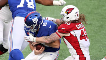 EAST RUTHERFORD, NEW JERSEY - DECEMBER 13: Linebacker Dennis Gardeck #45 of the Arizona Cardinals sacks quarterback Daniel Jones #8 of the New York Giants in the fourth quarter of the game at MetLife Stadium on December 13, 2020 in East Rutherford, New Jersey. (Photo by Al Bello/Getty Images)