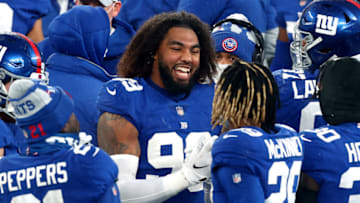 EAST RUTHERFORD, NEW JERSEY - JANUARY 03: Leonard Williams #99 of the New York Giants celebrates the teams lead with Xavier McKinney #29 late in the fourth quarter against the Dallas Cowboys at MetLife Stadium on January 03, 2021 in East Rutherford, New Jersey. (Photo by Mike Stobe/Getty Images)