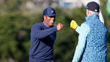 PEBBLE BEACH, CALIFORNIA - FEBRUARY 10: Larry Fitzgerald (L) of the NFL Arizona Cardinals and Bill Murray react on the third hole during the AT&T Every Shot Counts Charity Challenge on February 10, 2021 in Pebble Beach, California. (Photo by Steph Chambers/Getty Images)
