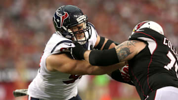 GLENDALE, AZ - NOVEMBER 10: Defensive end J.J. Watt #99 of the Houston Texans battles guard Dayrn Colledge #71 of the Arizona Cardinals at University of Phoenix Stadium on November 10, 2013 in Glendale, Arizona. (Photo by Stephen Dunn/Getty Images)